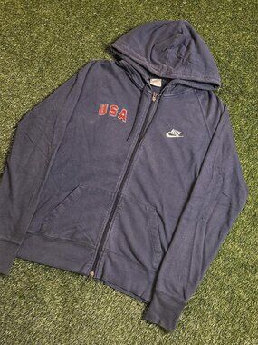 Nike navy women’s blue zip up hoodie Size XL...